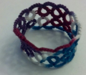 Yarnplayer's Remembrance ring tatted by Natalie Rogers. Lizbeth thread size 20 color Jewels (113).