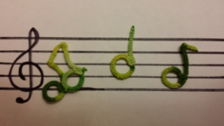 Tatted Musical Notes - designed by Nancy Tracy and tatted by Natalie Rogers.