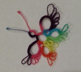 GR-8 Butterfly designed by Gary and Randy Houtz. Tatted by Natalie Rogers in Lizbeth, Rainbow Splash, size 20.